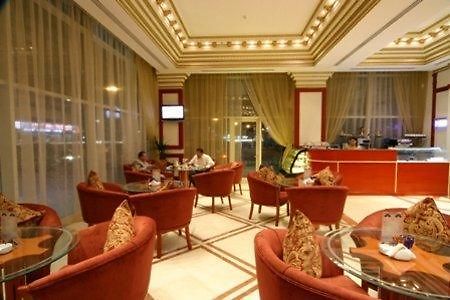 Emirates Palace Hotel Suites Sharjah Restaurang bild